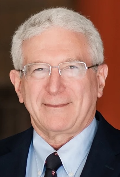 Paul Harmatz, MD, UCSF, smiling with grey background